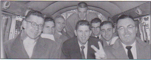 Photo of Dick Wilson, Wes Santee, Coach Bill Easton and the 1953 NCAA championship cross country team from KU.